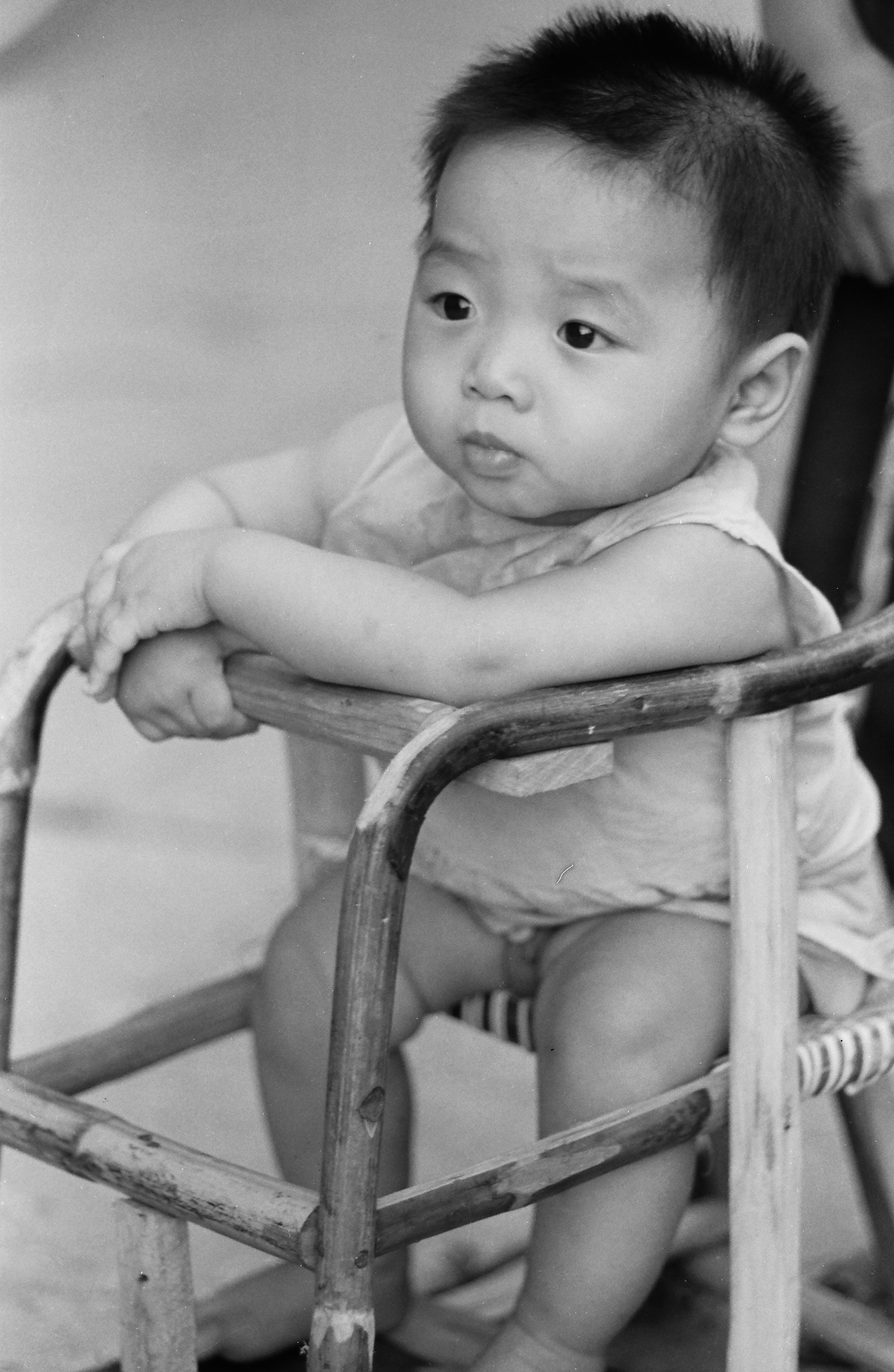 Utilizing a hand-made wooden baby frame.